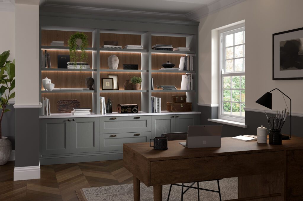 Bespoke dust grey office with shaker-style cabinetry, illuminated shelving, integrated storage and a timber desk workspace.