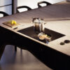 BORA Pure downdraft hob with integrated cooktop extractor and sleek black glass surface