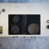 BORA_Professional_Rough_PKAS3FIABR_Topshot_off BORA Professional 3.0 downdraft hob with integrated cooktop extractor and sleek black glass surface