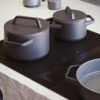 BORA_Professional_Rough_PKAS3FIABR_perspectiv BORA Professional 3.0 downdraft hob with integrated cooktop extractor and sleek black glass surface
