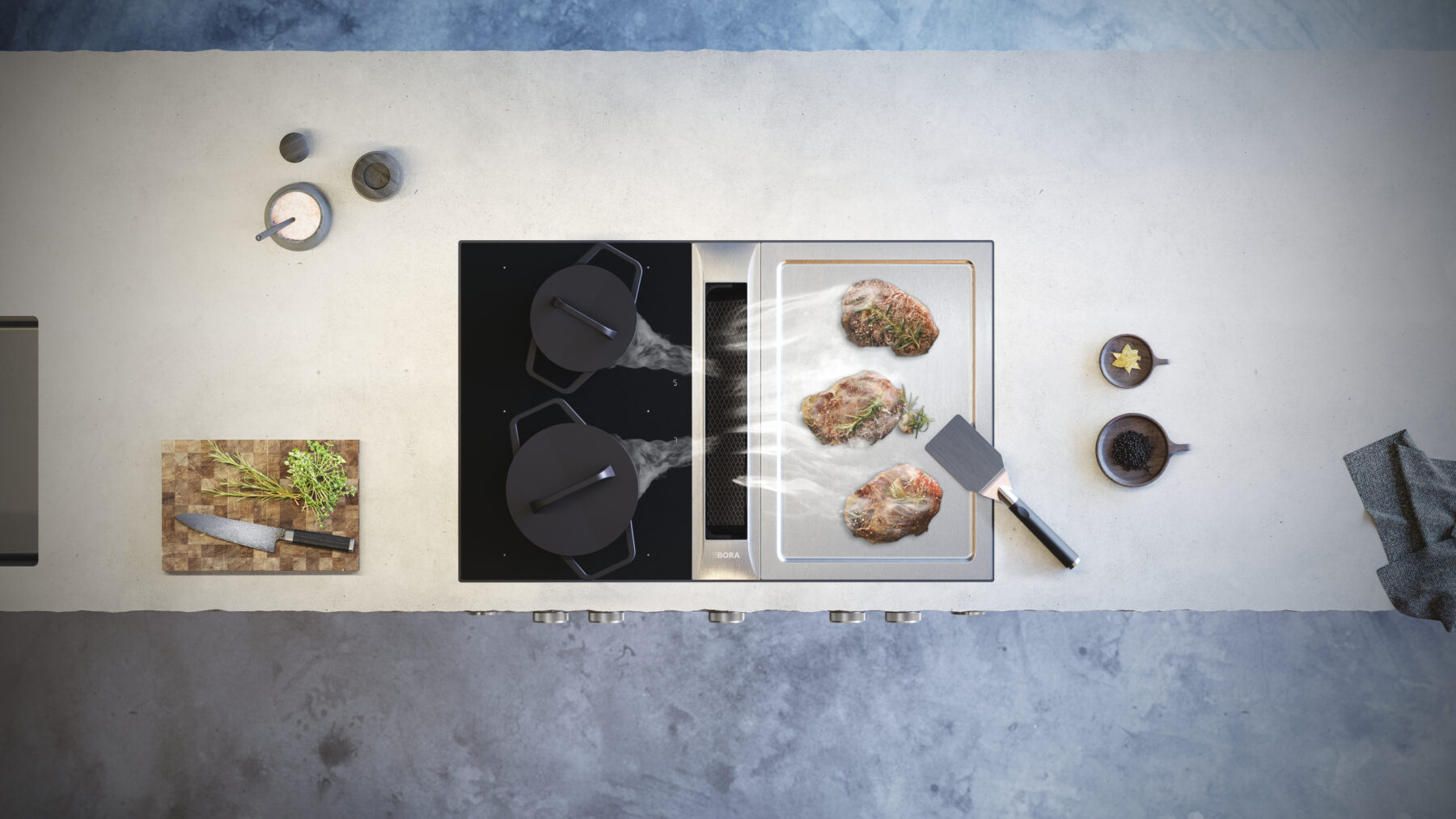 BORA_Professional_Rough_PKAS3FITR_Topshot BORA Professional 3.0 downdraft hob with integrated cooktop extractor and sleek black glass surface
