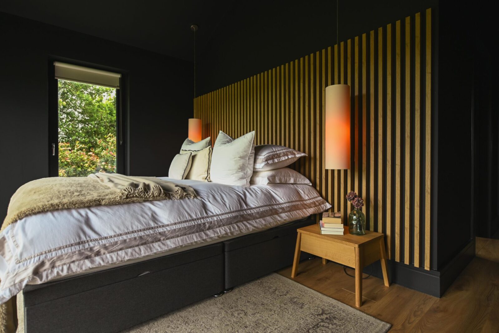 Modern Bedroom with Custom Wood Paneling and Ambient Lighting