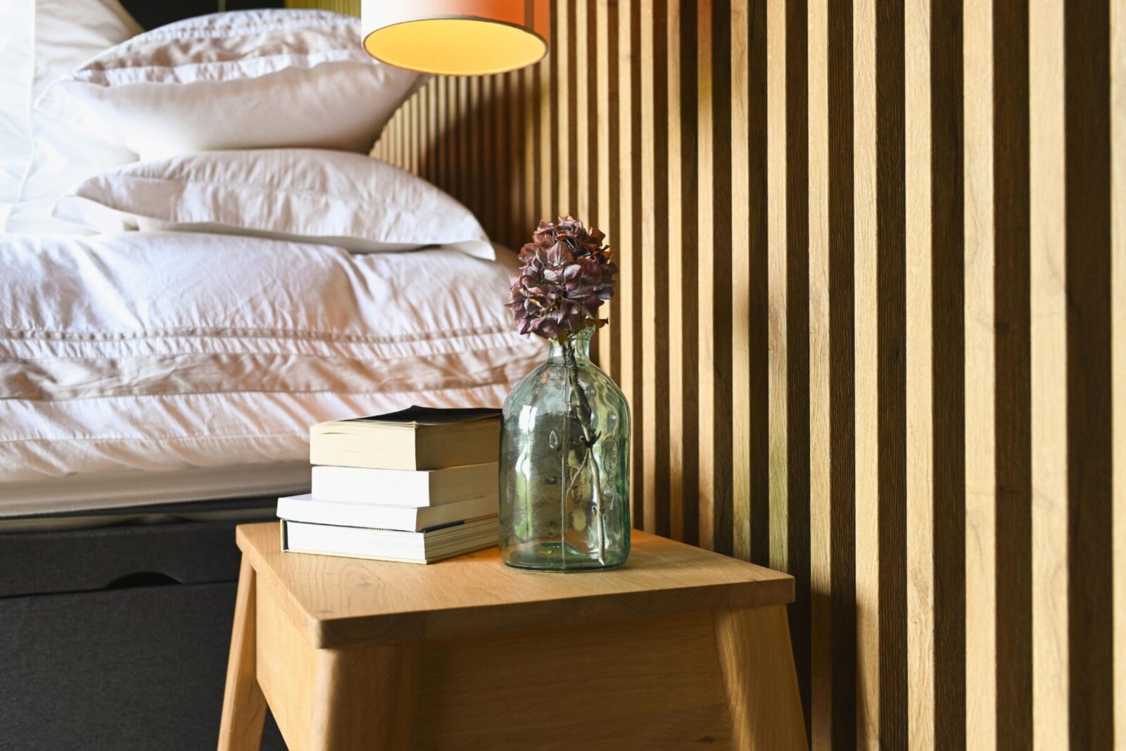 Modern Bedroom with Custom Wood Paneling and Ambient Lighting