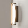 Mira black wall light with sculptural contemporary design and warm 3000K LED illumination.