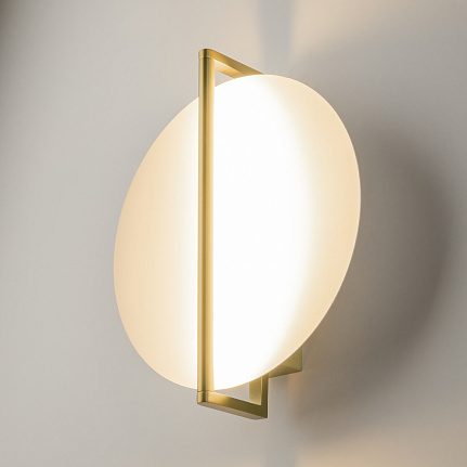 mira-gold-wall-light-angle Mira gold wall light with elegant contemporary design and warm metallic finish.