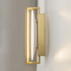 mira-gold-wall-light-side Mira gold wall light with elegant contemporary design and warm metallic finish.