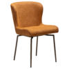 glam-swivel-chair-pumpkin-spice-boucle-w-antique-brass-legs_100208304-01-main A main image of the Glam swivel chair in pumpkin spice with black metal legs.