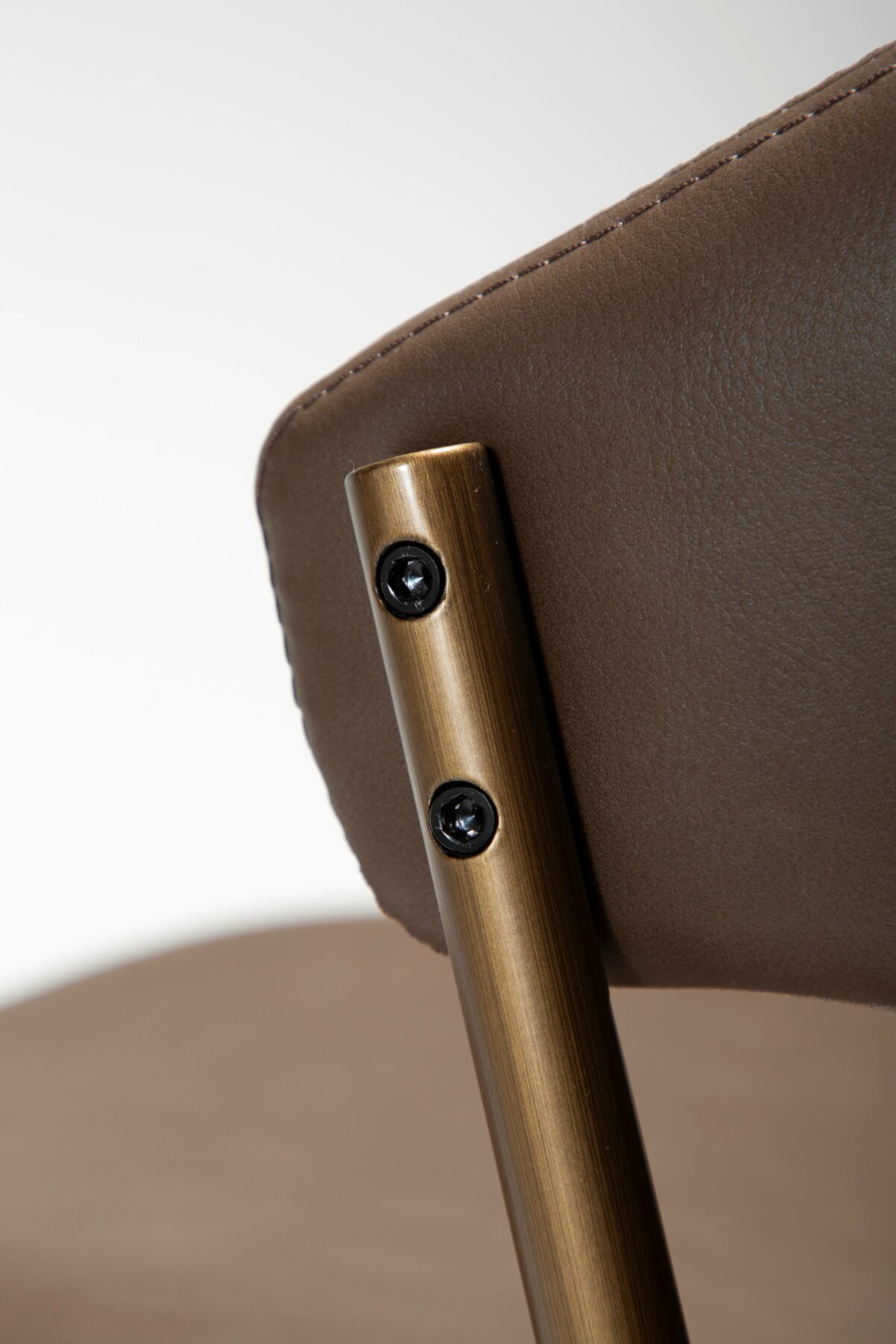 zone-chair-major-brown-faux-leather-w-antique-brass-legs_100107400-08-detail3