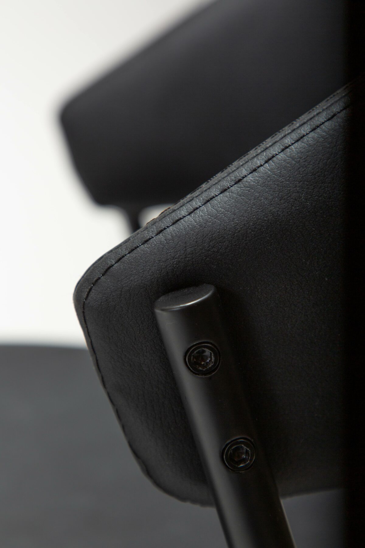 zone-chair-raven-black-faux-leather-w-black-legs_100107402-06-detail1