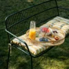 Eden Green Bench in the garden for summer dining