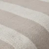 close up of grey and beige striped cotton linen fabric pouf texture