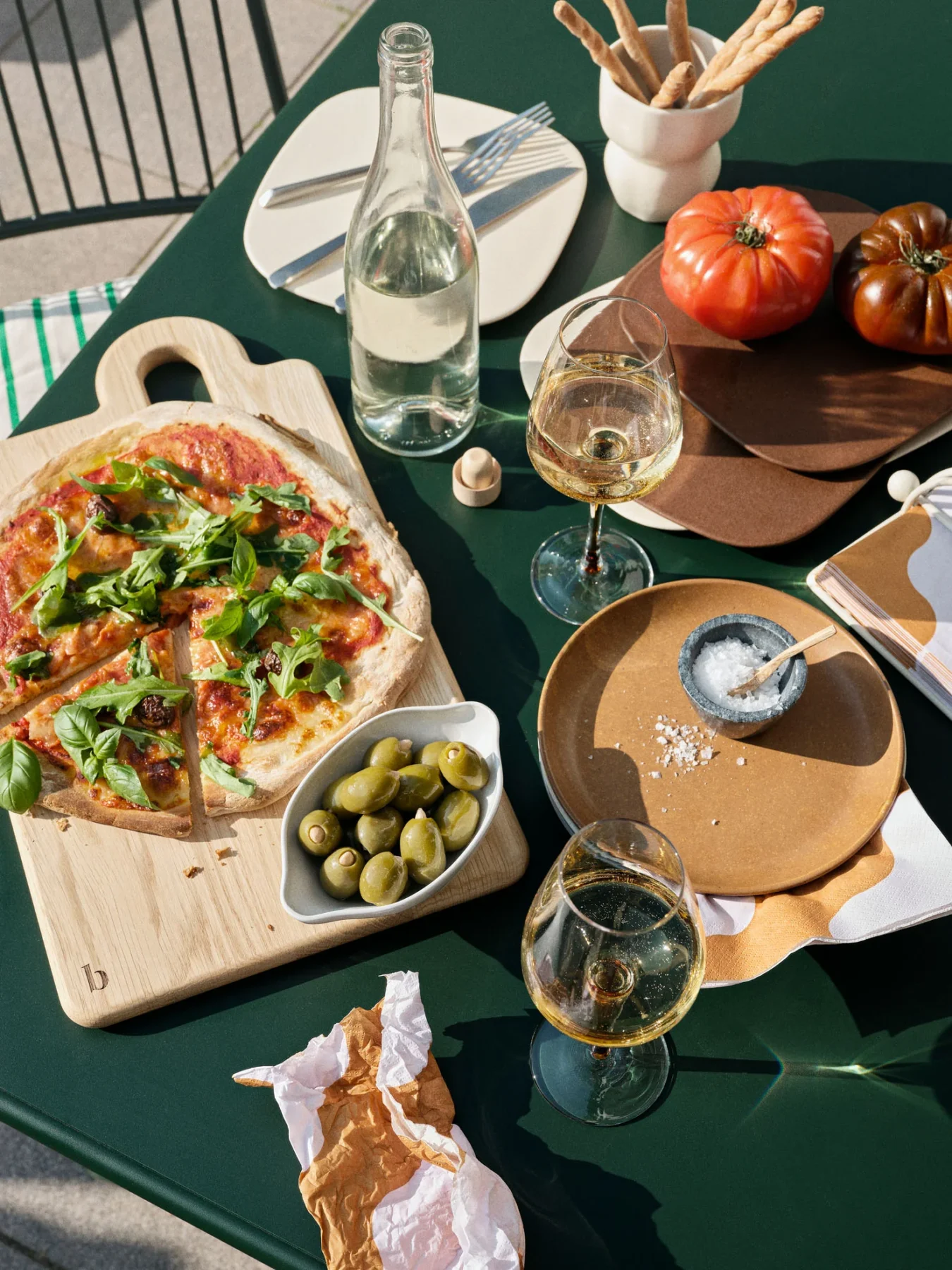 Pizza, olives and wine on the Eden Large Table Green