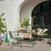 Outdoor dining setting with Eden Furniture in green