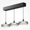 Float triple pendant light with smoked glass shades and black frame, modern kitchen island lighting