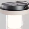 portable outdoor table lamp with glass shade and warm LED light, modern ambient lighting
