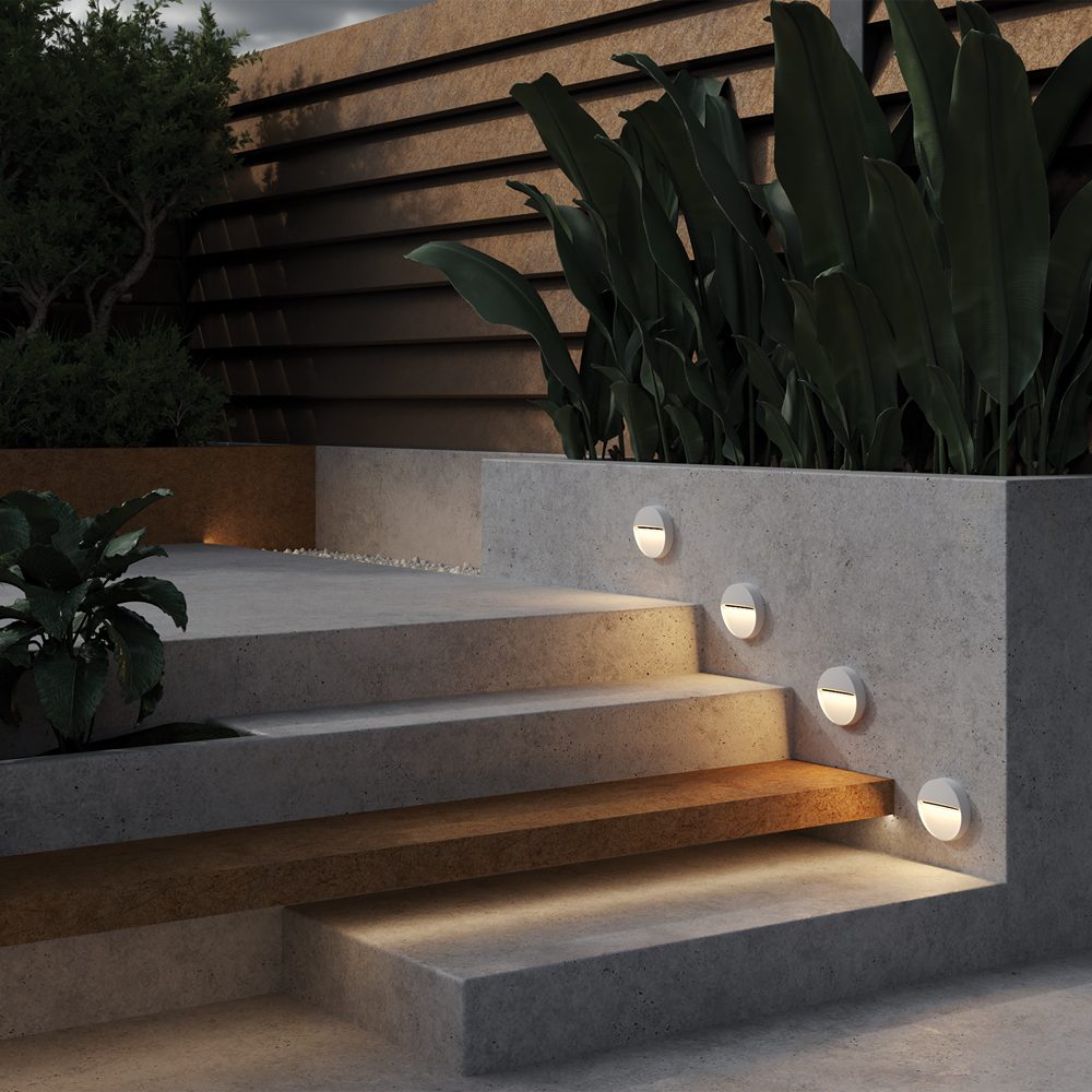 white outdoor stair light with downward glow, modern step light for pathway and steps