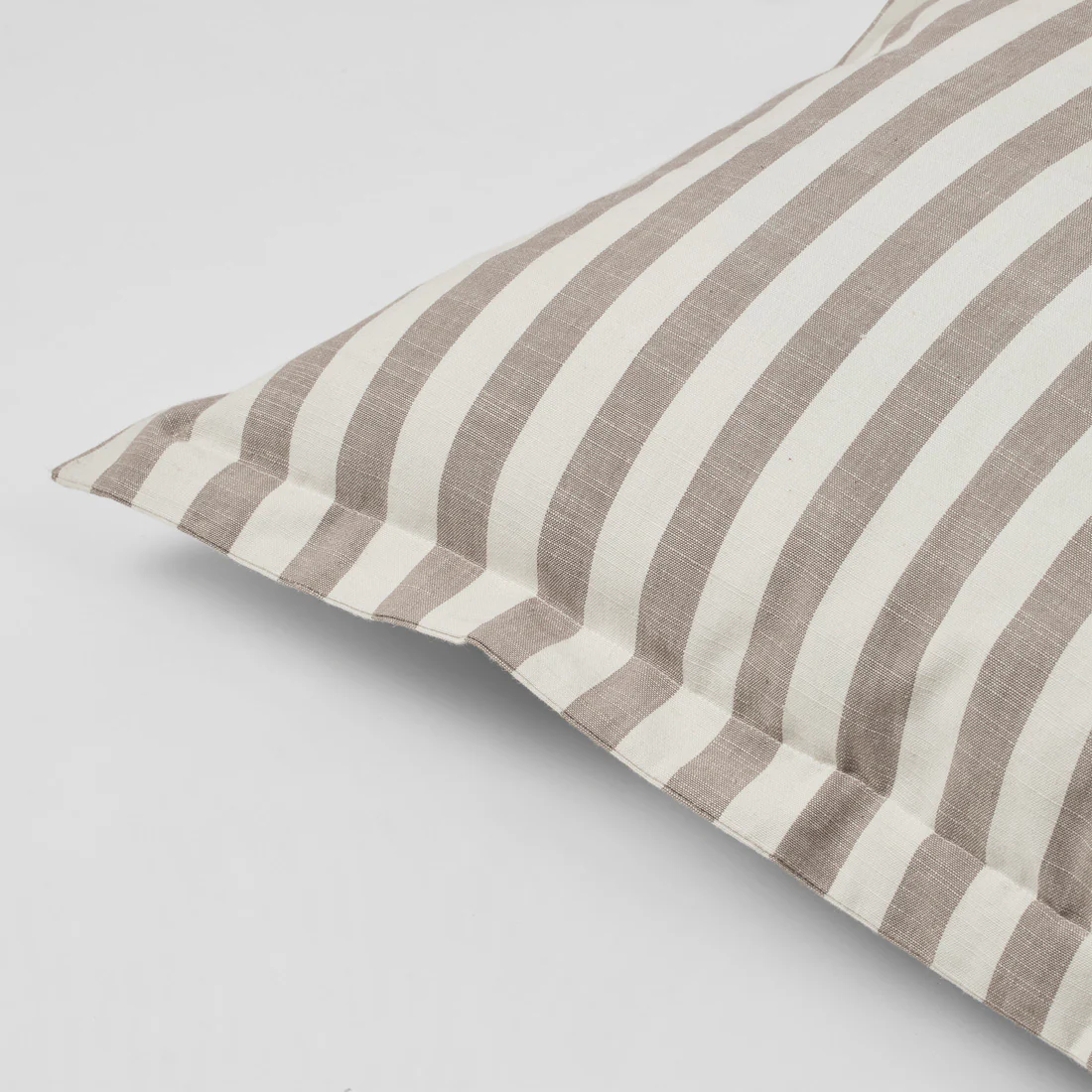 Close up image of the Marta cushion cover in grey