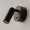 black adjustable wall reading light with focused spotlight, modern bedside wall light