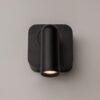 black adjustable wall reading light with focused spotlight, modern bedside wall light