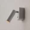 white adjustable wall reading light with focused spotlight, modern bedside wall light