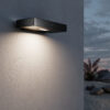 solar outdoor wall light with motion sensor in graphite finish, modern exterior lighting