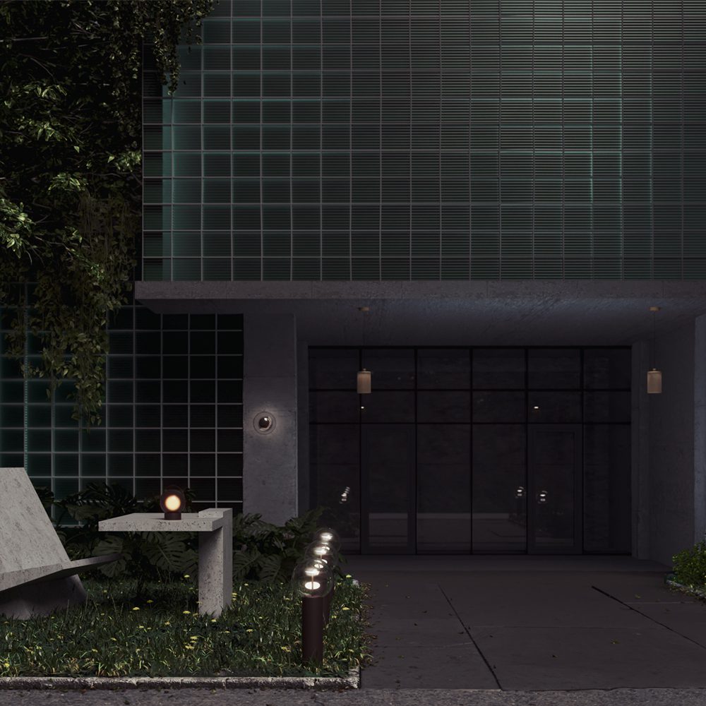 outdoor globe wall light with clear glass shade and bronze finish, modern exterior lighting