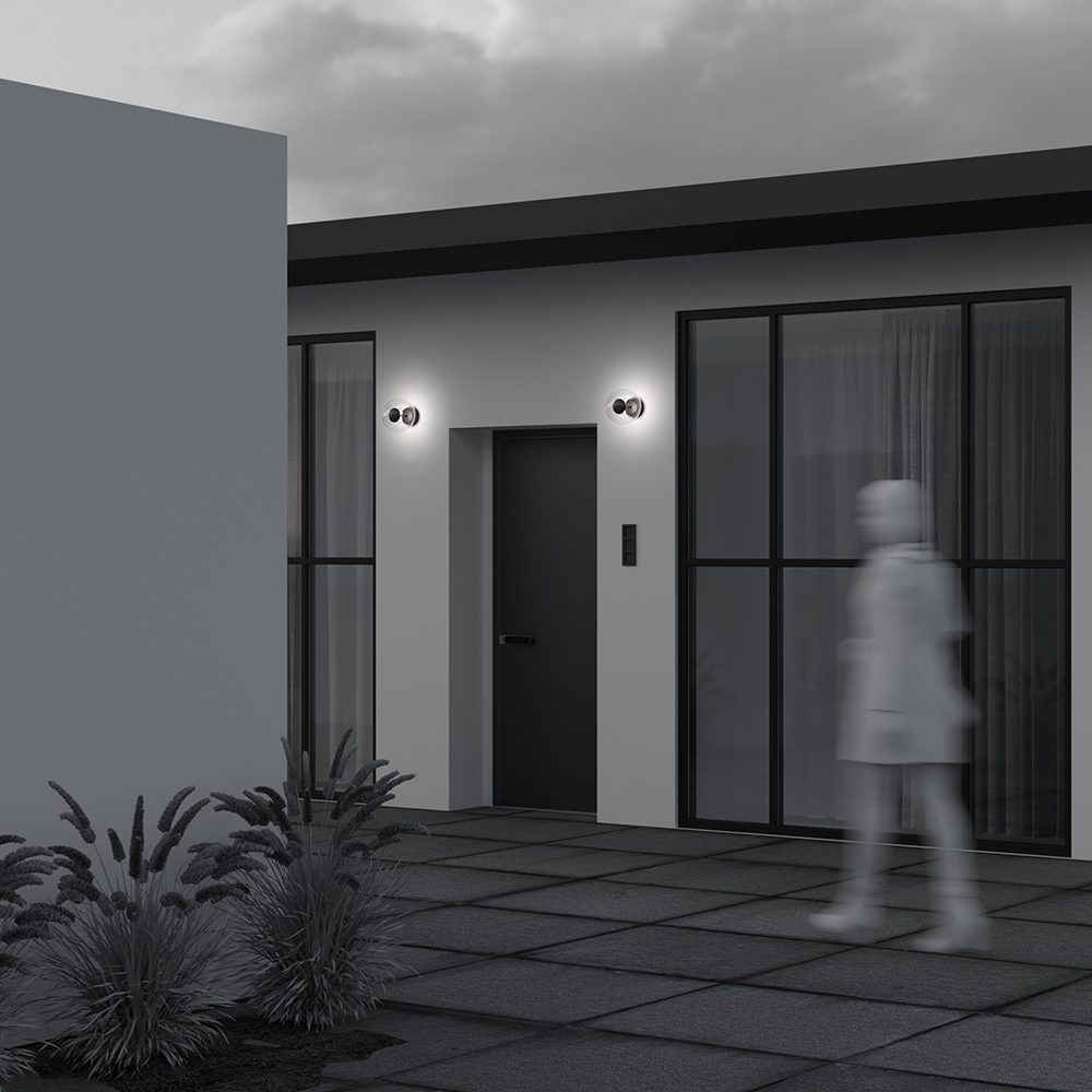 outdoor globe wall light with clear glass shade and bronze finish, modern exterior lighting