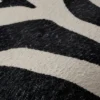 close upof the pattern fabric of the zebra pouf