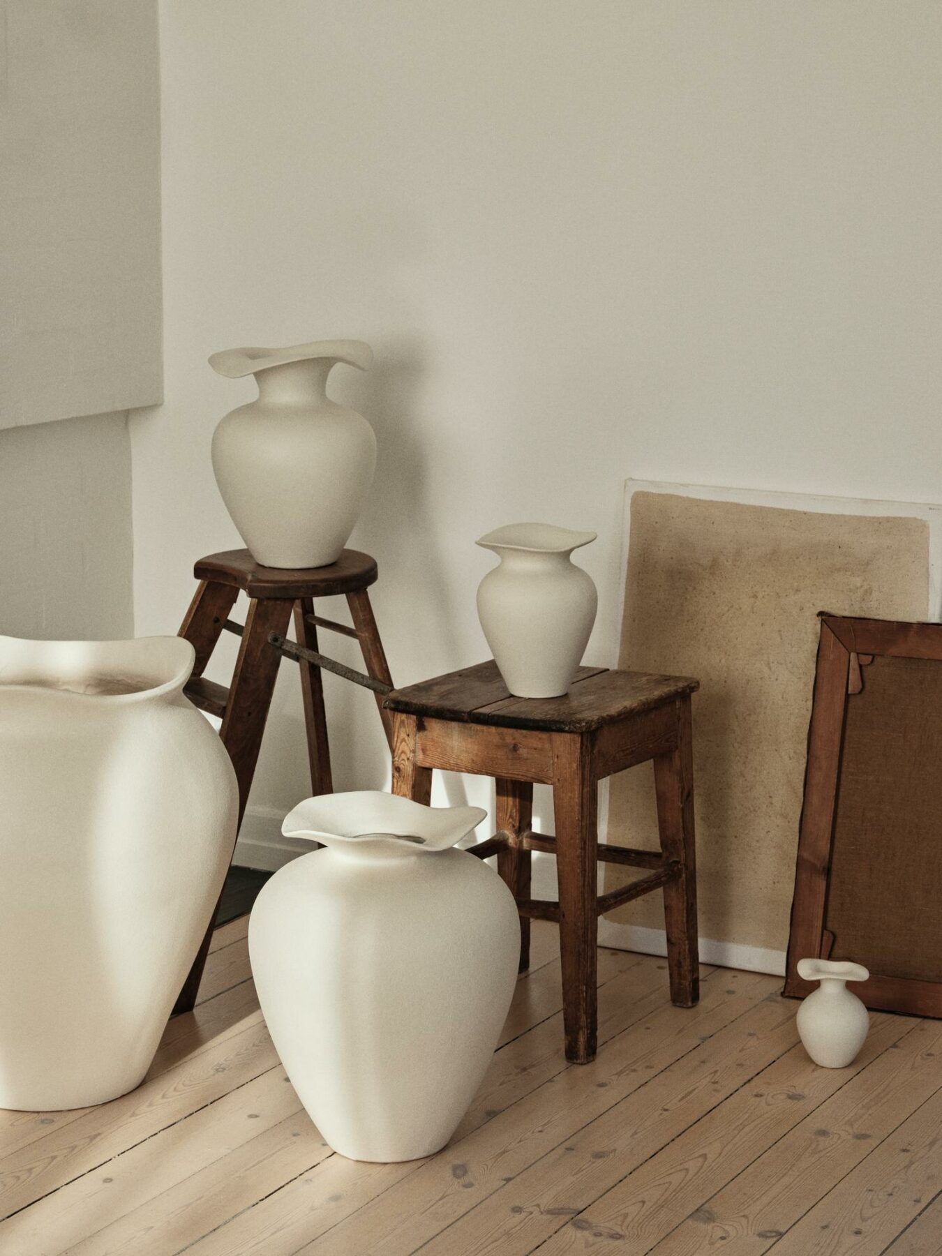 A collection of Florentina White Vases in different sizes