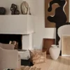 The Florentina White Vase Large placed on a sitting room floor.