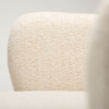 close up of the simple beige boucle fabric on the Bae chair