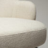 bae-swivel-counter-stool-simply-beige-bouclé-w-antique-brass-swivel-legs_300208343-07-detail2 Close up view image of the bae swivel counter stool in simply beige boucle fabric with antique brass legs