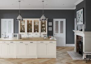 Traditional porcelain shaker kitchen with central island, oak worktops and charcoal feature walls.
