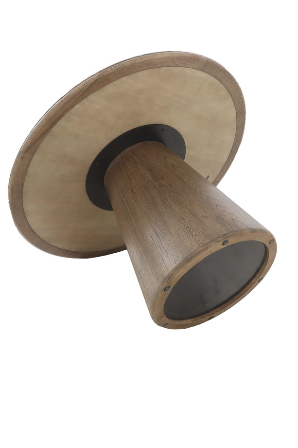 Canopus walnut oak round dining table with a central pedestal base, visible wood grain detail, and warm natural finish on a white background