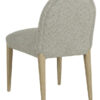 Cumbria light green and ivory upholstered dining chair with a rounded backrest, padded seat, and light oak-coloured wooden legs on a white background.