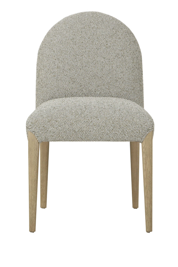 Cumbria light green and ivory upholstered dining chair with a rounded backrest, padded seat, and light oak-coloured wooden legs on a white background.