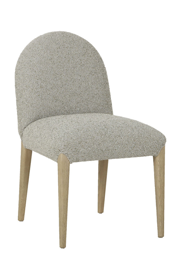 Cumbria light green and ivory upholstered dining chair with a rounded backrest, padded seat, and light oak-coloured wooden legs on a white background.