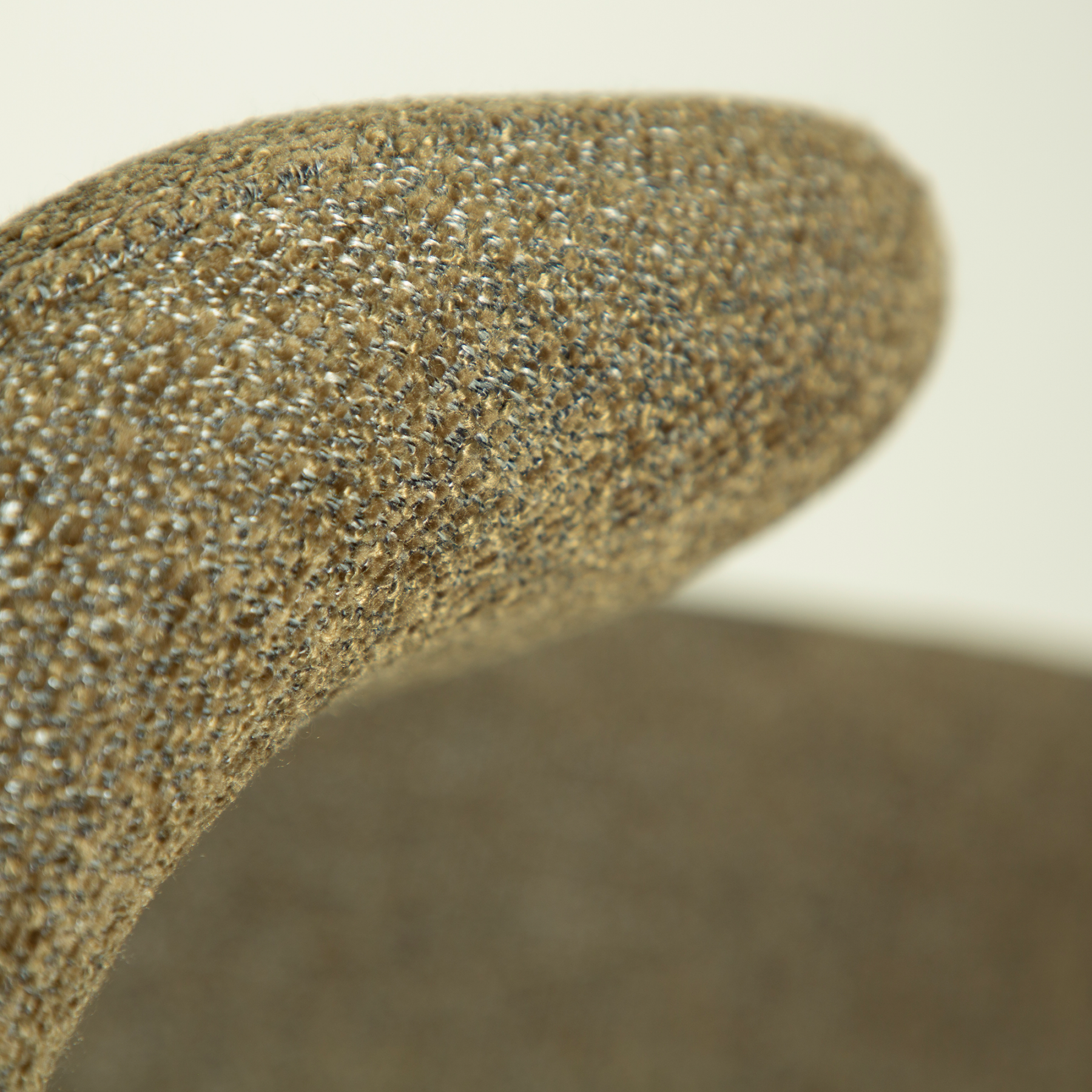 glam-chair-swivel-dark-olive-w-antique-pewter-swivel-legs_100208303-06-detail1 Close up of the glam swivel chair in dark olive with antique pewter legs.