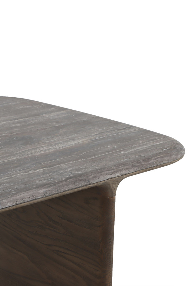 Howitt walnut oak rectangular dining table with bold panel legs, softened edges, and visible wood grain detail on a white background.