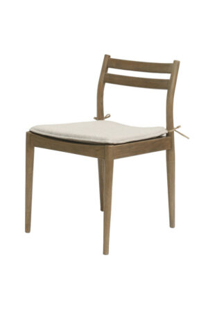 Marlow oak dining chair with a warm oak-coloured wooden frame, slatted backrest, and light grey upholstered seat cushion on a white background.