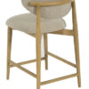 Arden light grey upholstered counterstool with a natural wooden frame, padded seat, rounded backrest, and built-in footrest.