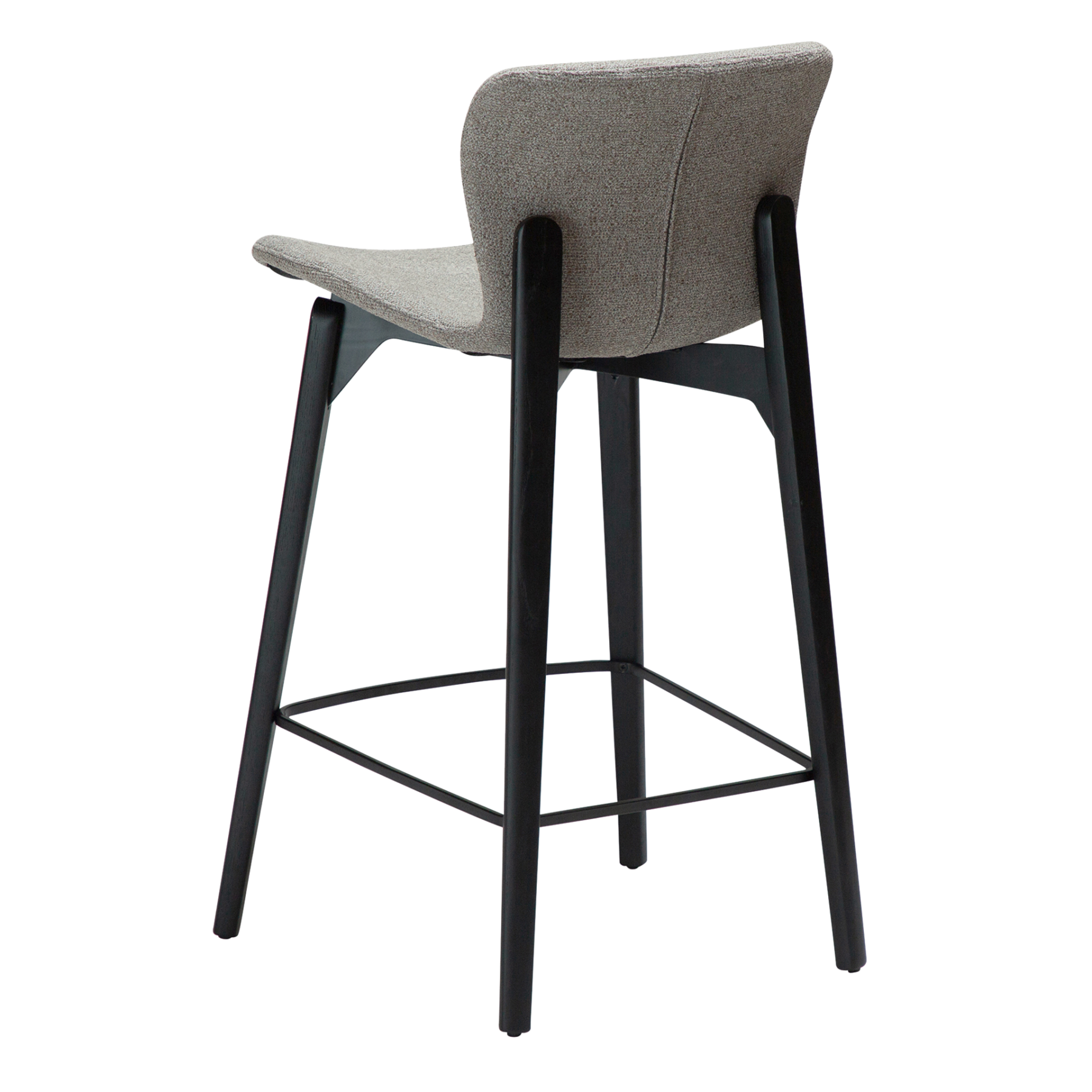 paragon-counter-stool-pebble-earth-fabric-black-stained-ash-legs-angled Paragon counter stool upholstered in Pebble Earth fabric with black-stained ash wood legs, featuring a curved seat and backrest for modern kitchen islands and breakfast bars.