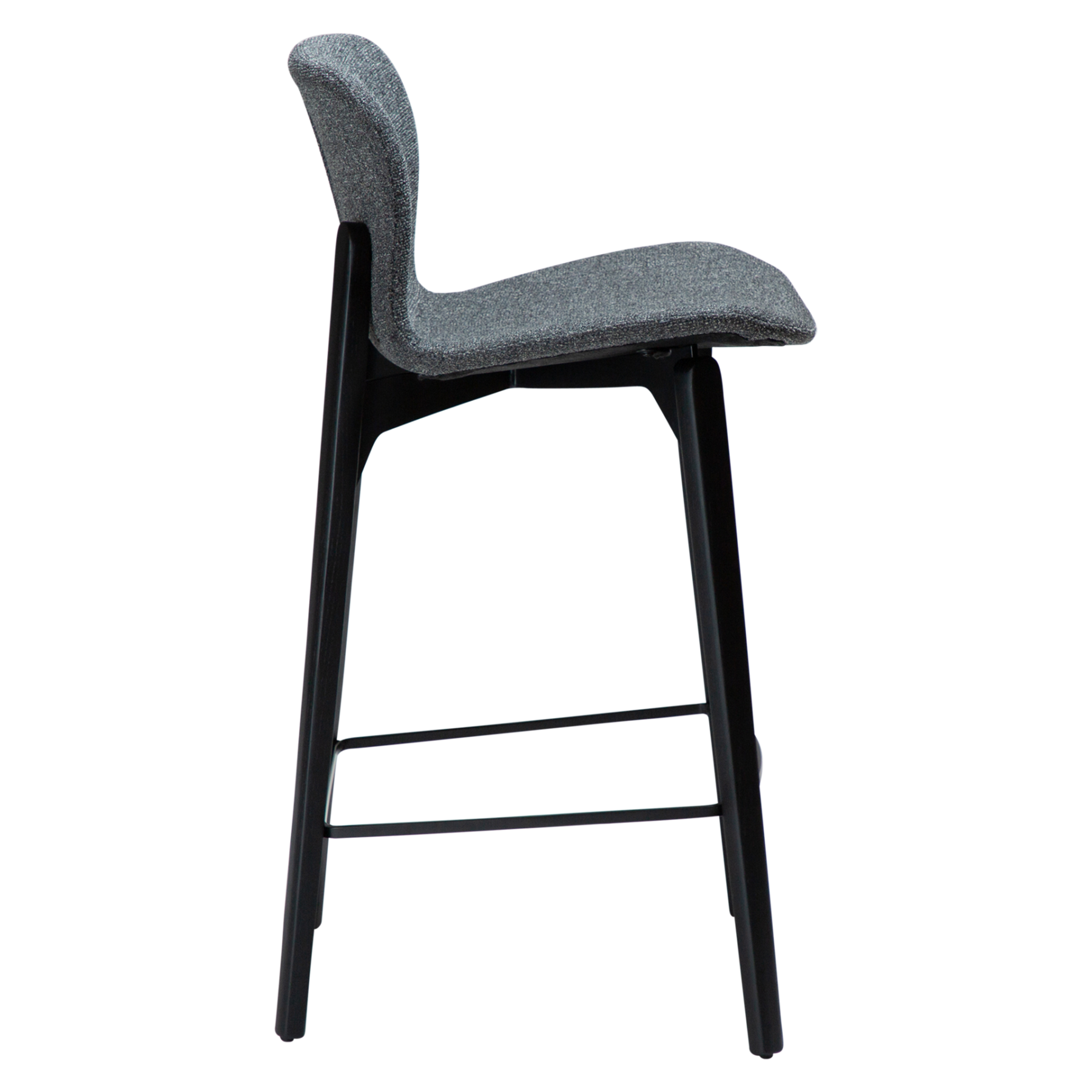 paragon-counter-stool-pebble-grey-fabric-black-stained-ash-legs-side Paragon counter stool upholstered in Pebble Grey fabric with black-stained ash wood legs, featuring a curved seat and backrest for modern kitchen islands and breakfast bars.
