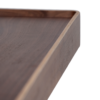 Protopia wall shelf in walnut veneer with a slim profile and curved ends, ideal for displaying artwork, books, photographs, and decorative accessories.