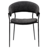 reboot-armchair-raven-black-front Reboot armchair upholstered in Raven Black fabric with a modern curved silhouette and upholstered frame.