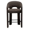 Splendor counter stool upholstered in major brown bouclé fabric with a curved backrest, padded seat and integrated black footrest, ideal for kitchen islands and breakfast bars.