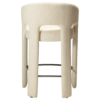 Splendor counter stool upholstered in simply beige fabric with a curved backrest, padded seat and integrated black footrest, ideal for kitchen islands and breakfast bars.