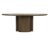 Walnut oak oval dining table with a warm wood finish, rounded tabletop, and sculptural pedestal base on a white background.