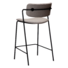 ZED counter stool upholstered in Cashmere bouclé fabric with slim black metal legs and integrated armrests, designed for modern kitchen islands and breakfast bars.