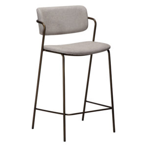 Main image of the Zed counterstool upjolstered in Cashmere Boucle fabric with anitque brass metal legs.